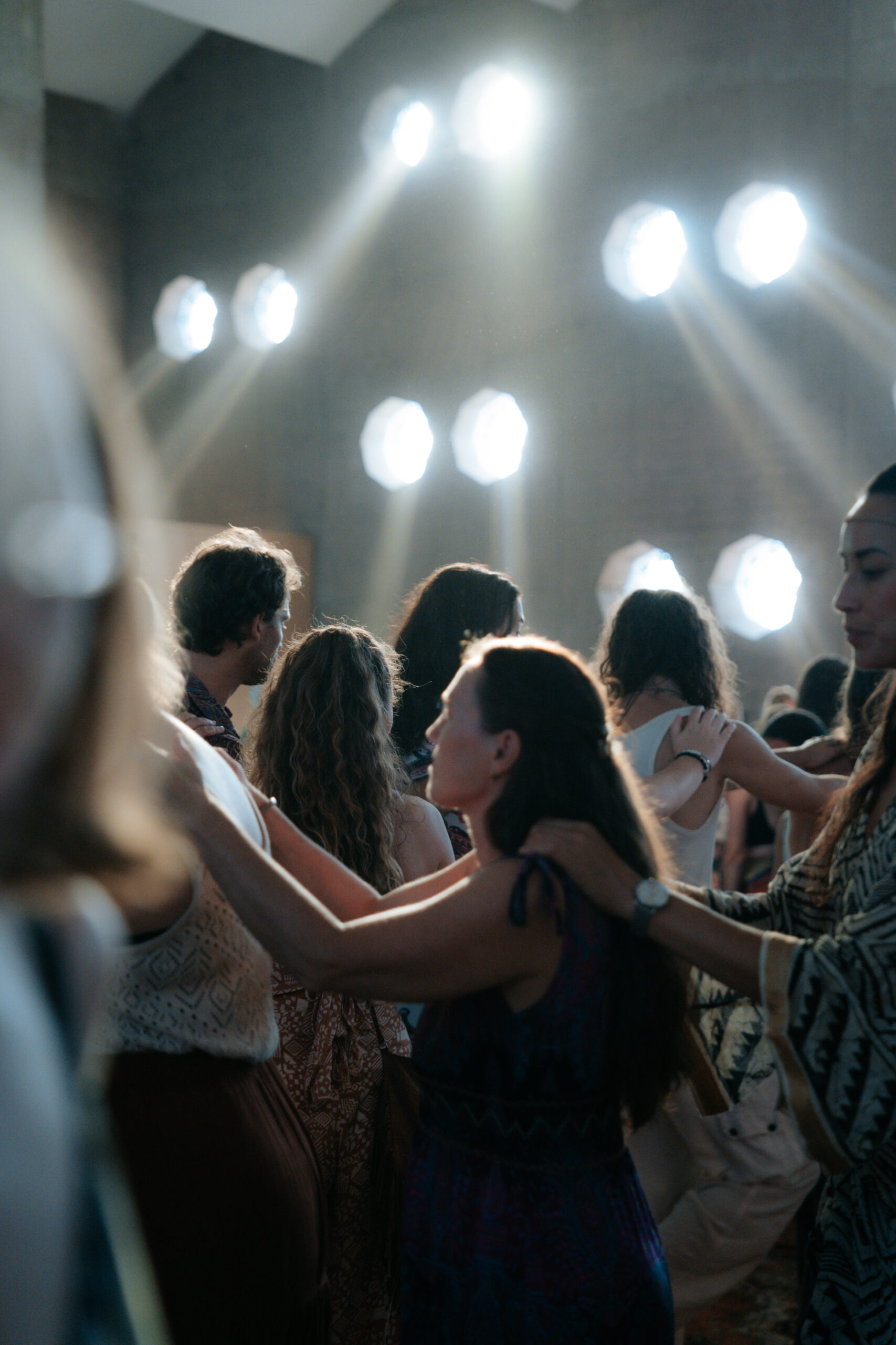 a group of people dancing during a conscious festival