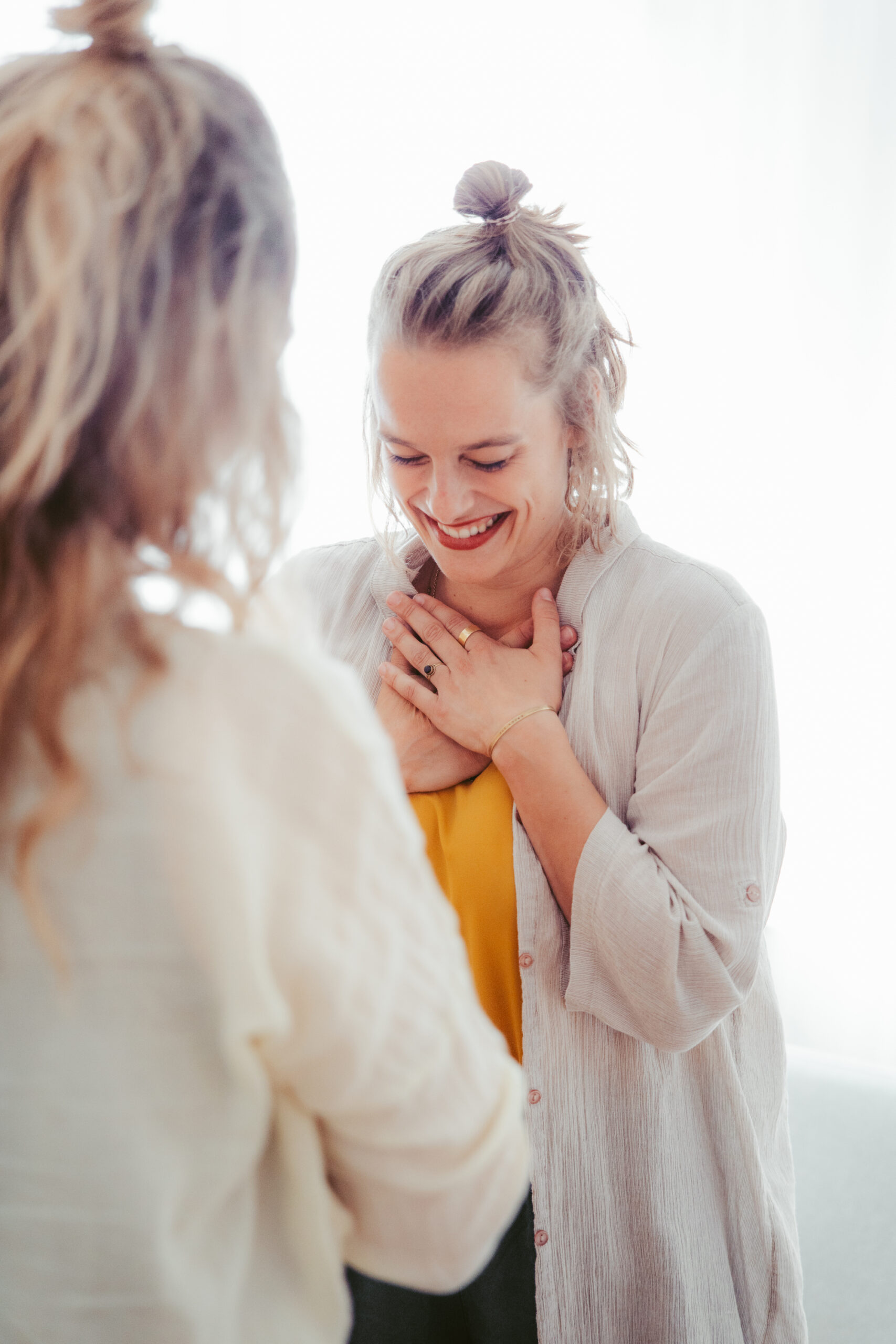 photo of a women business owner thanking her client