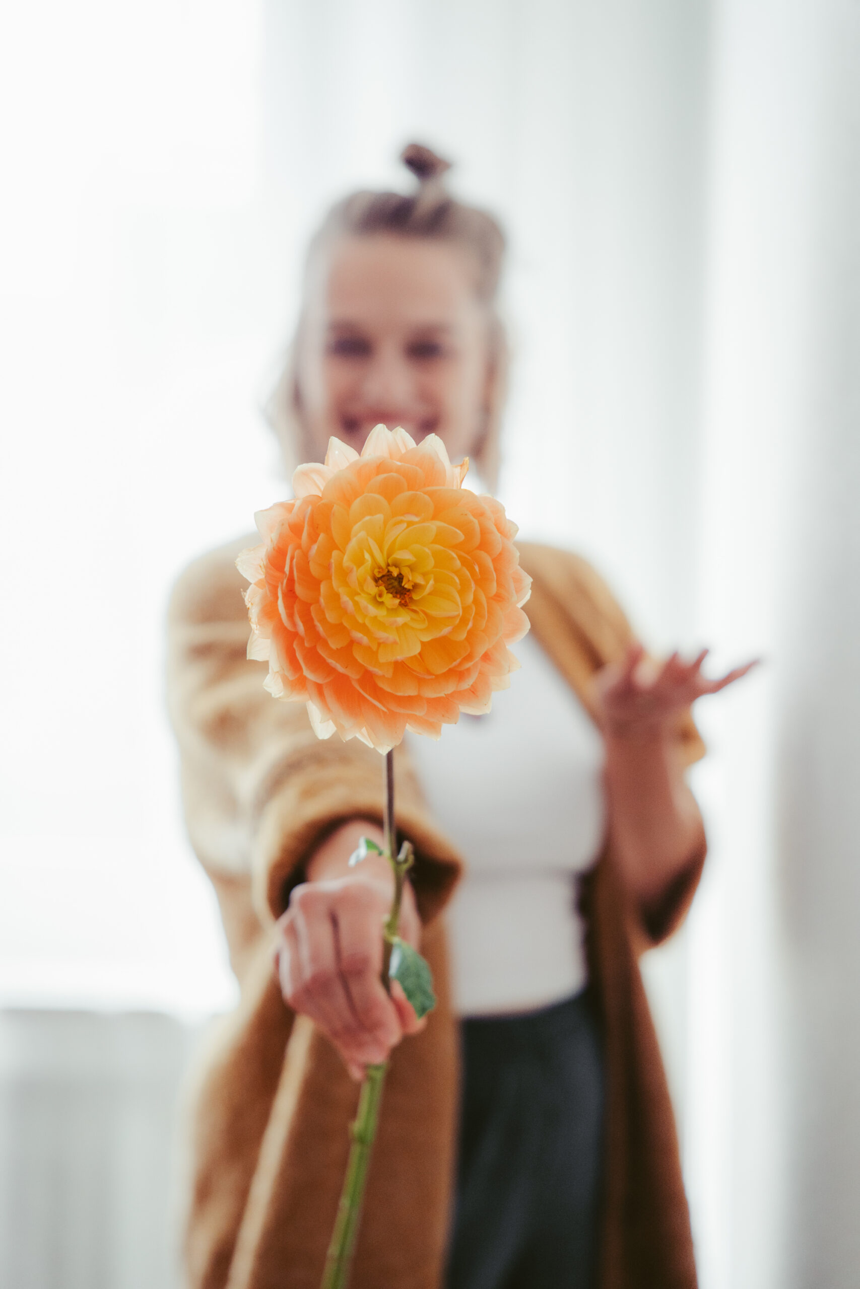 photo of a women business owner thanking her client